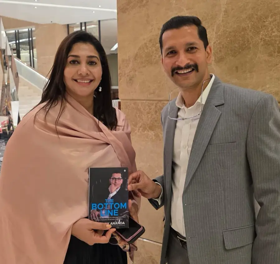 Anju Bobby George, Olympian, World Championships Bronze Medallist with Chinmay Ananda's book