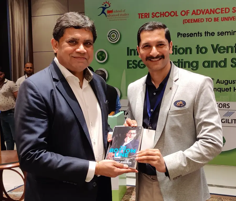 Bharat Kaushal, MD, Hitachi India with Chinmay Ananda's book