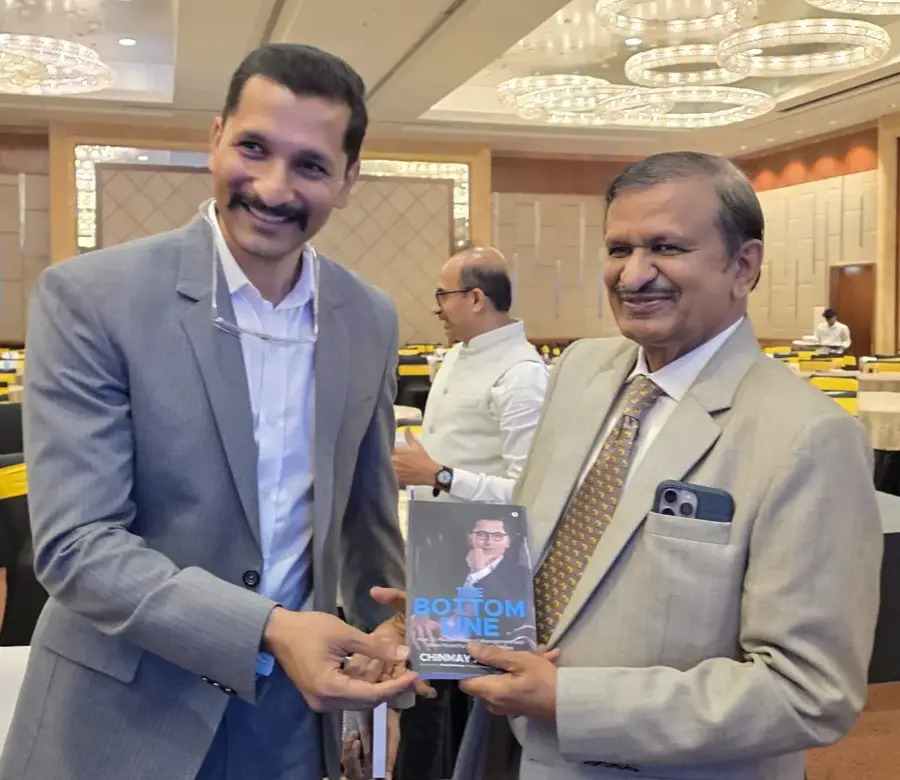 Dr CN Manjunath, Member of Parliament, Senior Cardiologist with Chinmay Ananda's book