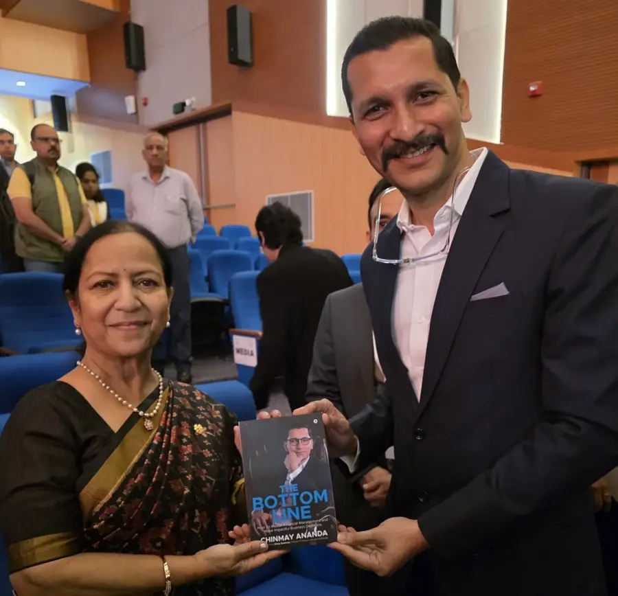 Justice Sadhana Jadhav with Chinmay Ananda's book