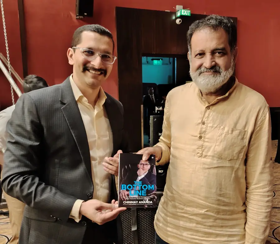 Mohandas Pai, Aarin Capital with Chinmay Ananda's book