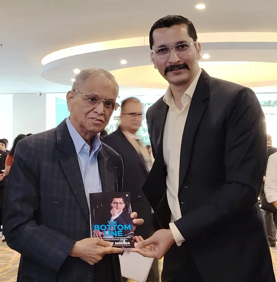 Narayana Murthy, Co-founder, Infosys with Chinmay Ananda's book