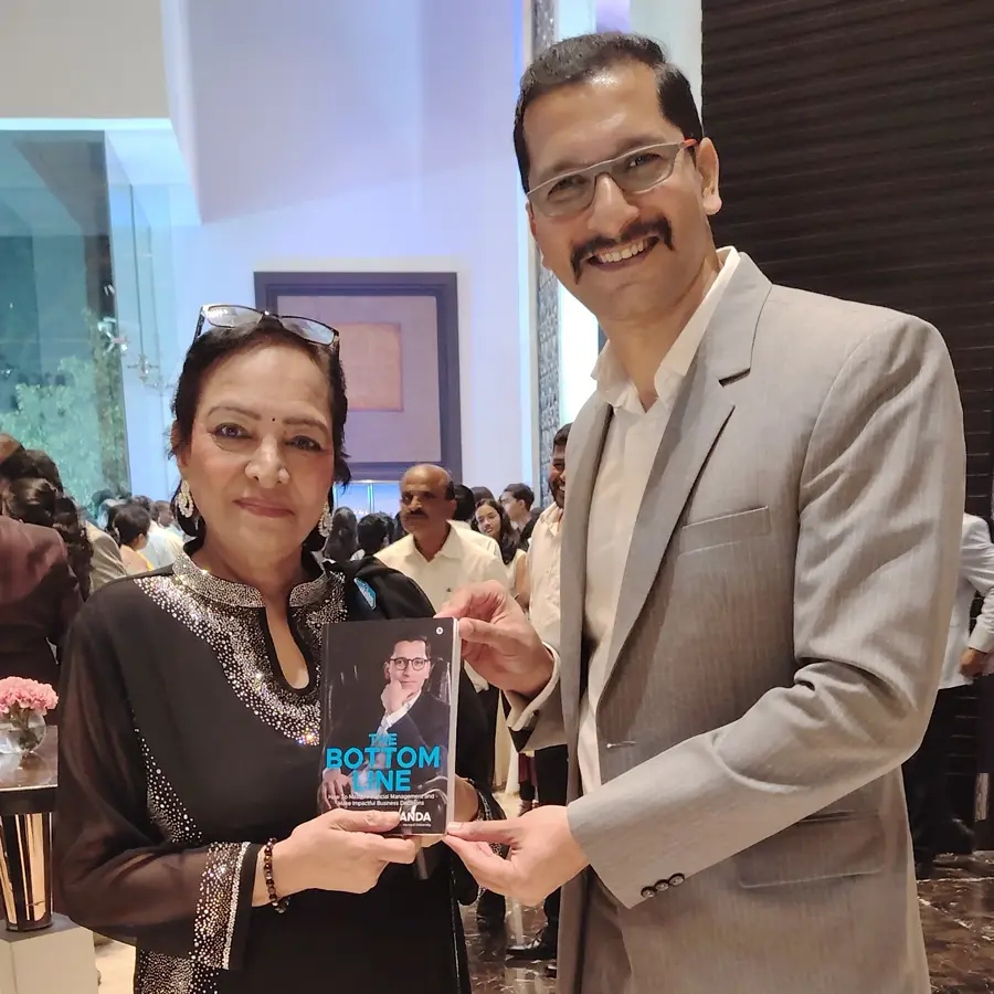 Padma Shri Dr. Kamini Arvind Rao with Chinmay Ananda's book