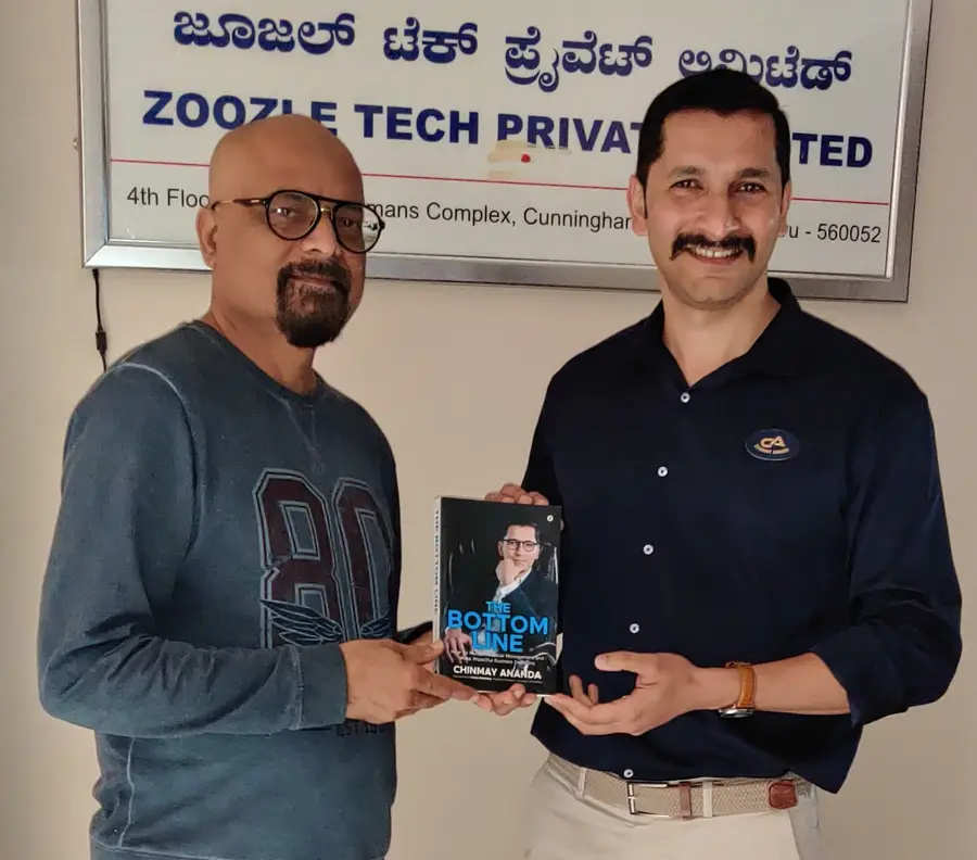 Rajesh Dembla, Investor & Entrepreneur with Chinmay Ananda's book