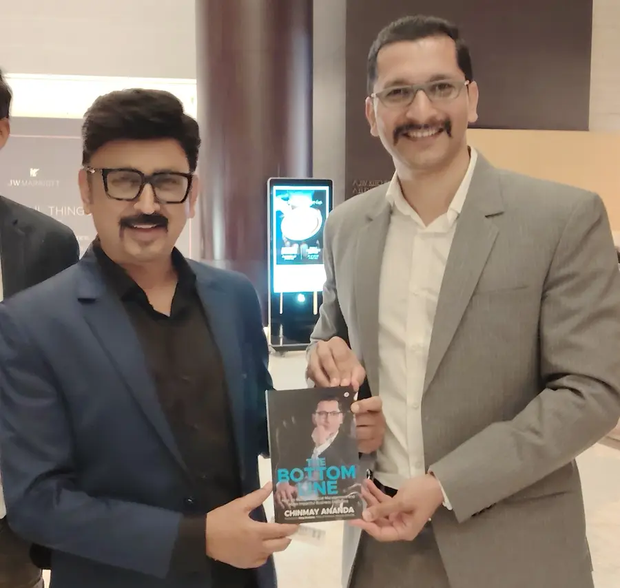 Ramesh Aravind, Indian actor, director with Chinmay Ananda's book