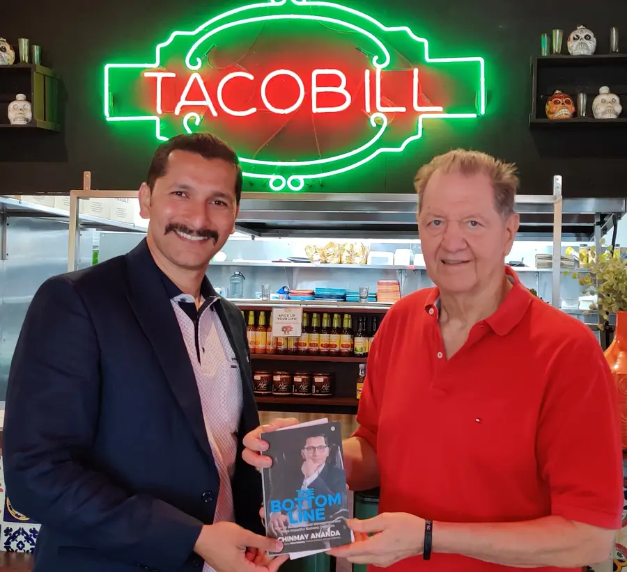 Stan Teschke, Owner, Taco Bill, Australia with Chinmay Ananda's book