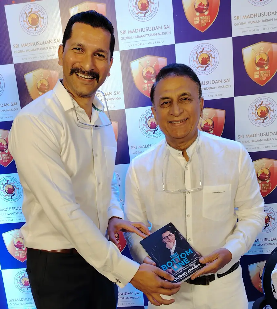 Sunil Gavaskar, former captain, Indian cricket team with Chinmay Ananda's book