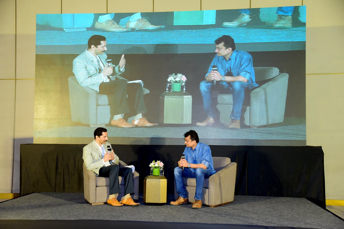 Chinmay moderating a panel discussion